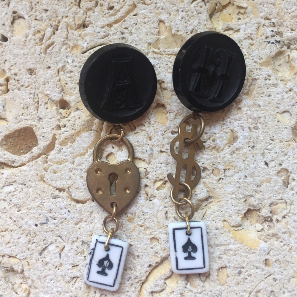Pierced earrings made with buttons, charms